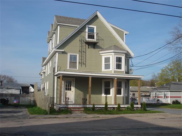 21 12th Street Wareham, MA 02558 - Photo 2 of 9 a front view of a house with a yard