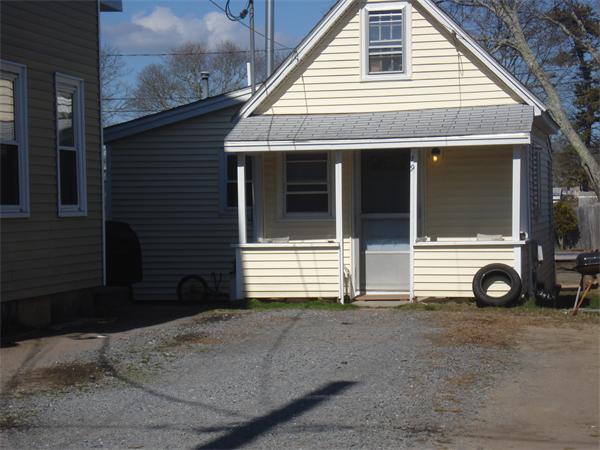 21 12th Street Wareham, MA 02558 - Photo 4 of 9 a view of a house with a parking space