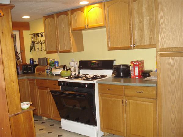 21 12th Street Wareham, MA 02558 - Photo 7 of 9 a kitchen with a sink and cabinets