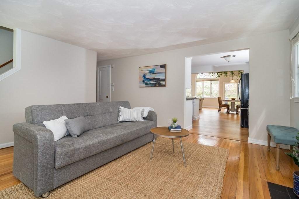 15 Nimitz Circle Natick, MA 01760 - Photo 11 of 21 a living room with furniture and a wooden floor