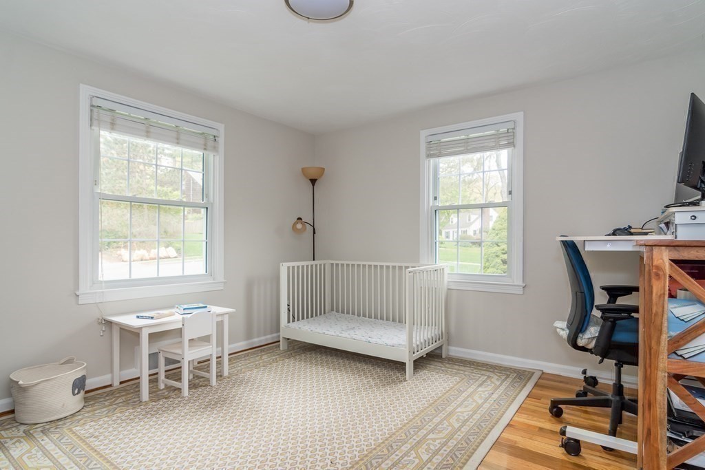 15 Nimitz Circle Natick, MA 01760 - Photo 15 of 21 a bedroom with furniture and a window