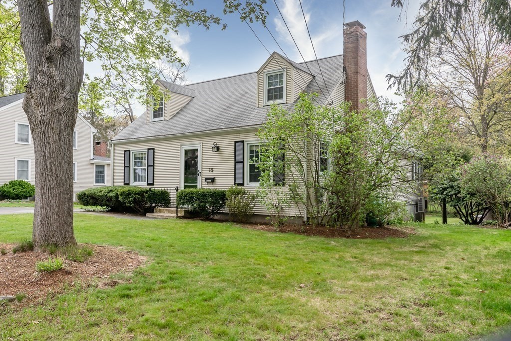 15 Nimitz Circle Natick, MA 01760 - Photo 2 of 21 a front view of a house with garden