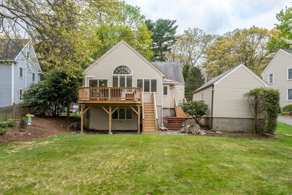 15 Nimitz Circle Natick, MA 01760 - Photo 3 of 21 a front view of a house with garden