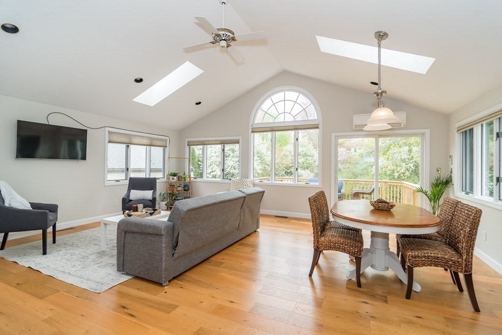 15 Nimitz Circle Natick, MA 01760 - Photo 5 of 21 a view of a livingroom with furniture window and wooden floor