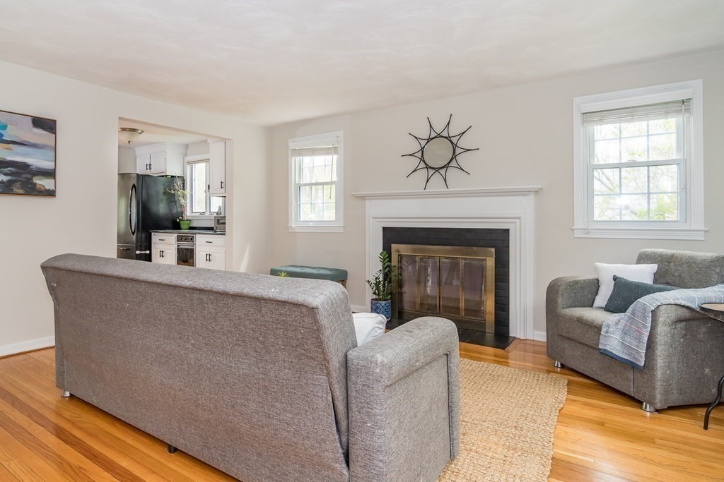 15 Nimitz Circle Natick, MA 01760 - Photo 10 of 21 a living room with furniture and a fireplace