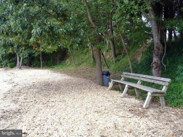 73 Jenkins Road Chesapeake City, MD 21915 - Photo 22 of 24 Community beach with bench