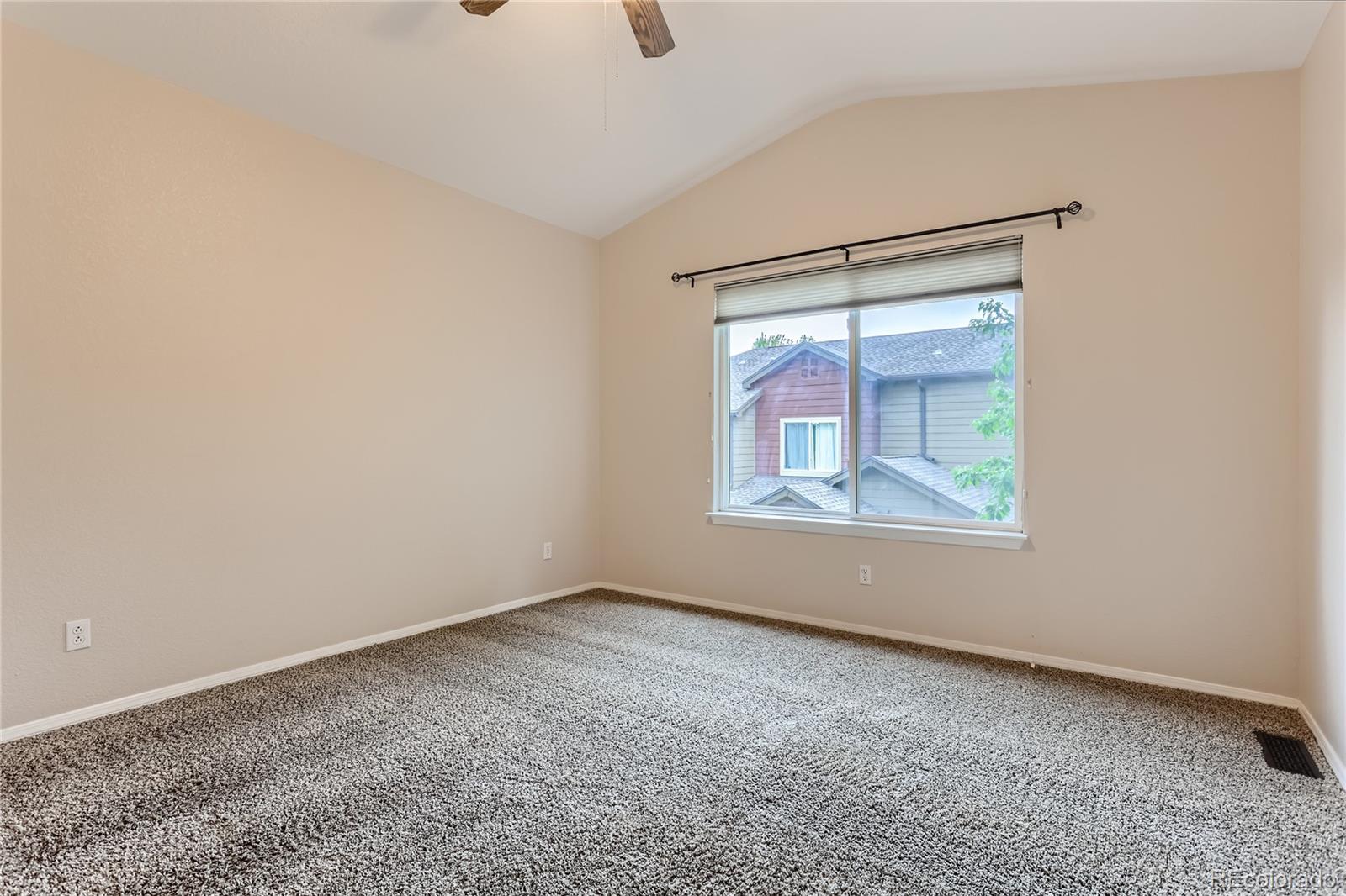 6478 Silver Mesa Drive, Unit E Highlands Ranch, CO 80130 - Photo 16 of 34 a view of an empty room with a window