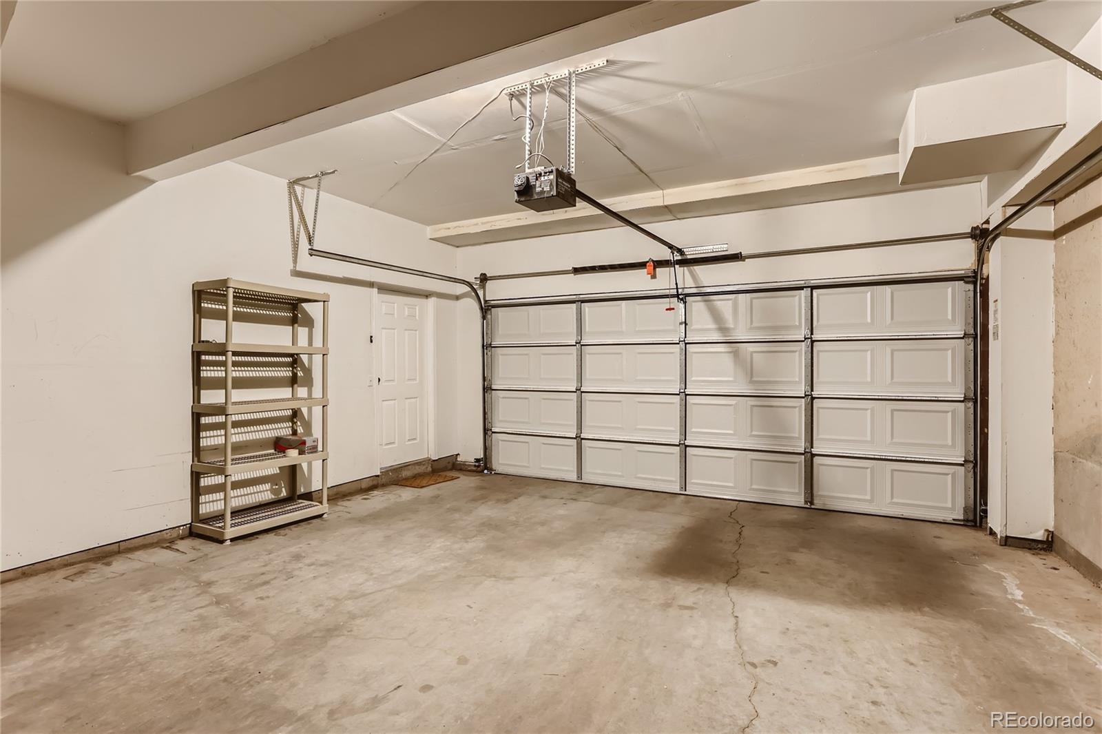 6478 Silver Mesa Drive, Unit E Highlands Ranch, CO 80130 - Photo 26 of 34 a view of a garage