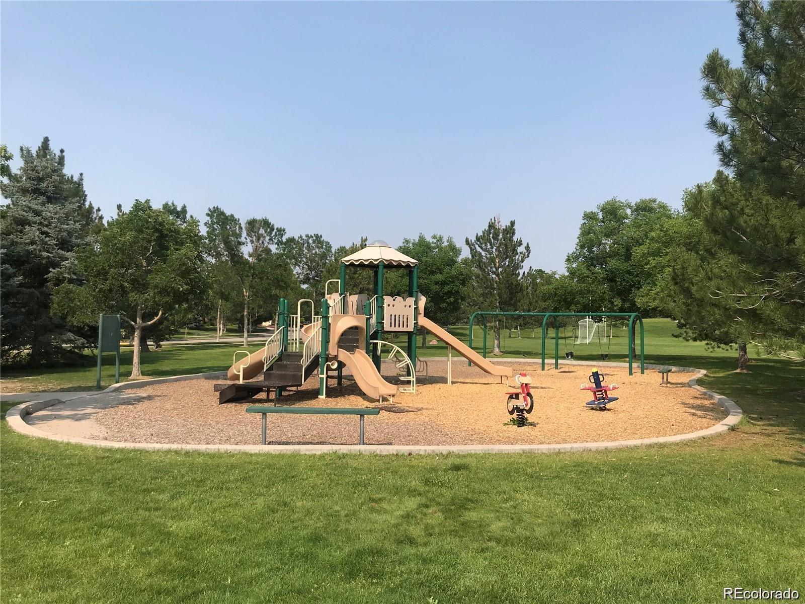 6478 Silver Mesa Drive, Unit E Highlands Ranch, CO 80130 - Photo 30 of 34 a park with kid zone