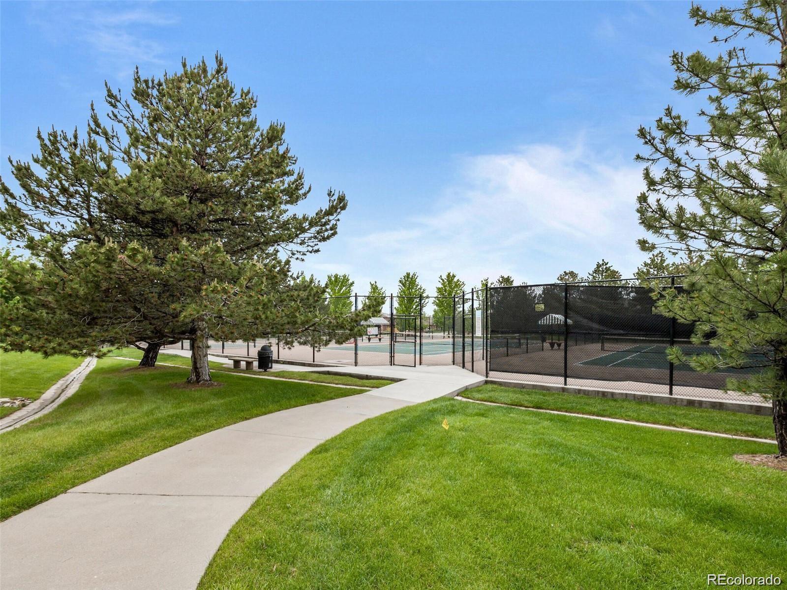 6478 Silver Mesa Drive, Unit E Highlands Ranch, CO 80130 - Photo 32 of 34 a view of a park with tree s