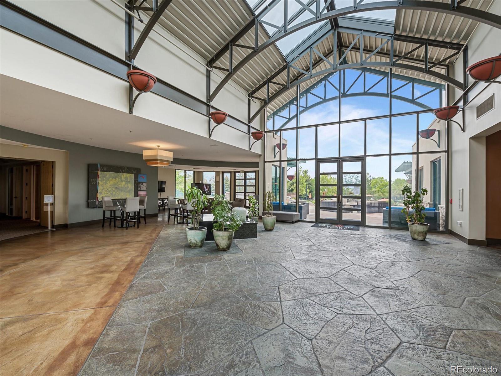 6478 Silver Mesa Drive, Unit E Highlands Ranch, CO 80130 - Photo 34 of 34 a view of a building with sitting area