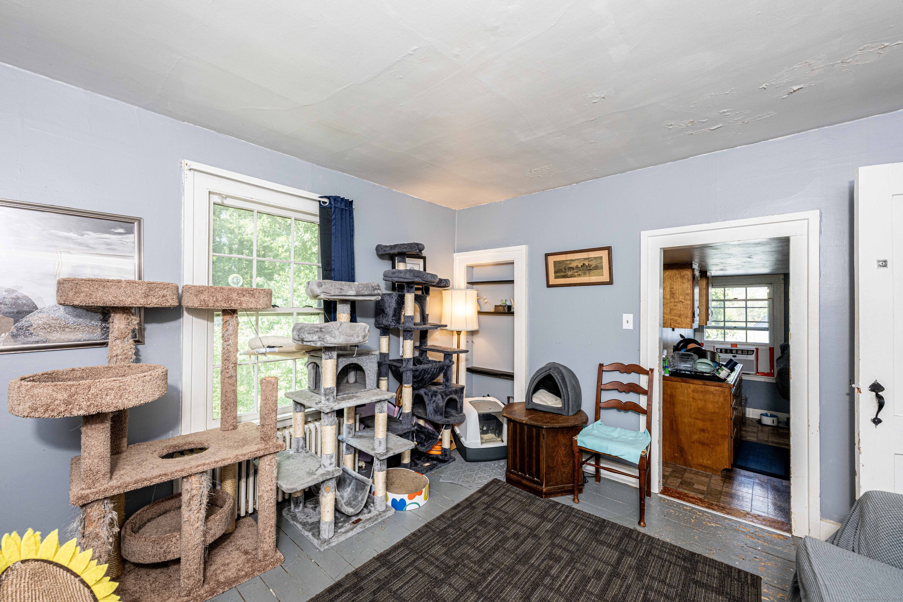 174 Whitfield Street Guilford, CT 06437 - Photo 20 of 40 a view of a livingroom with workspace and a window