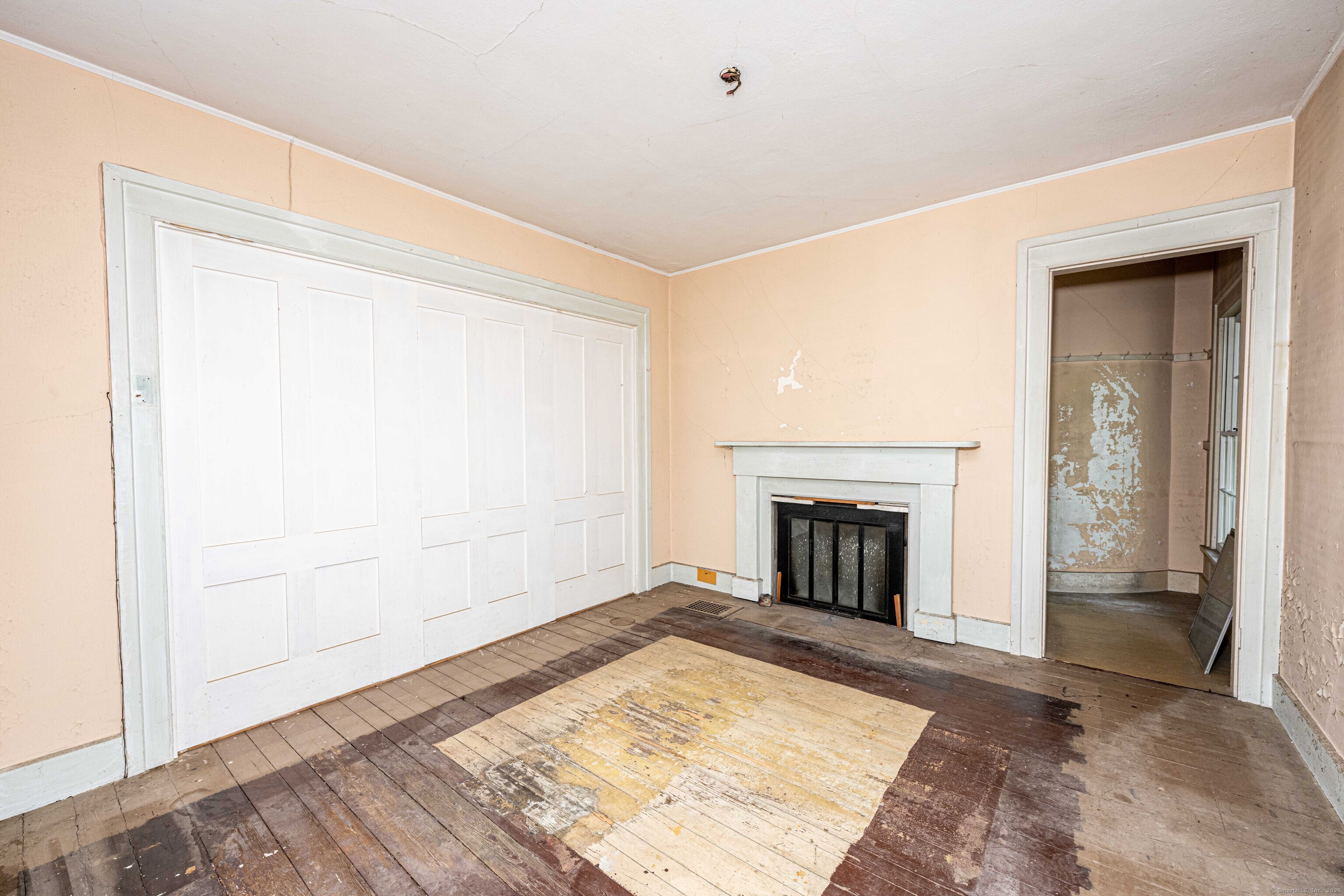 174 Whitfield Street Guilford, CT 06437 - Photo 36 of 40 an empty room with large windows