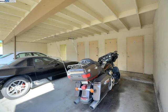a car parked in front of garage