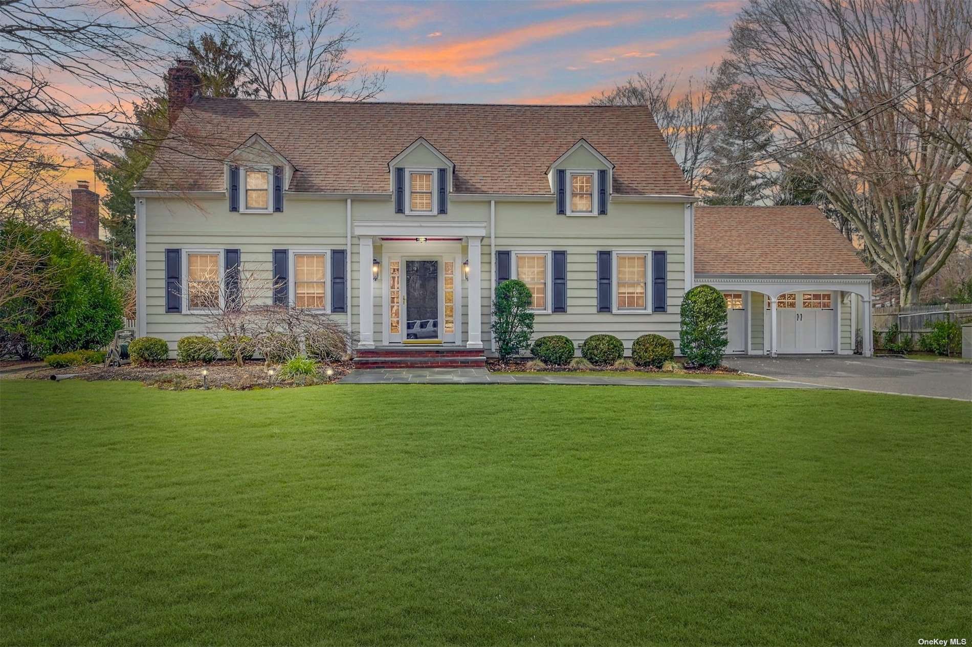 19 Coot Road Locust Valley, NY 11560 - Photo 1 of 1 a front view of house with yard and green space