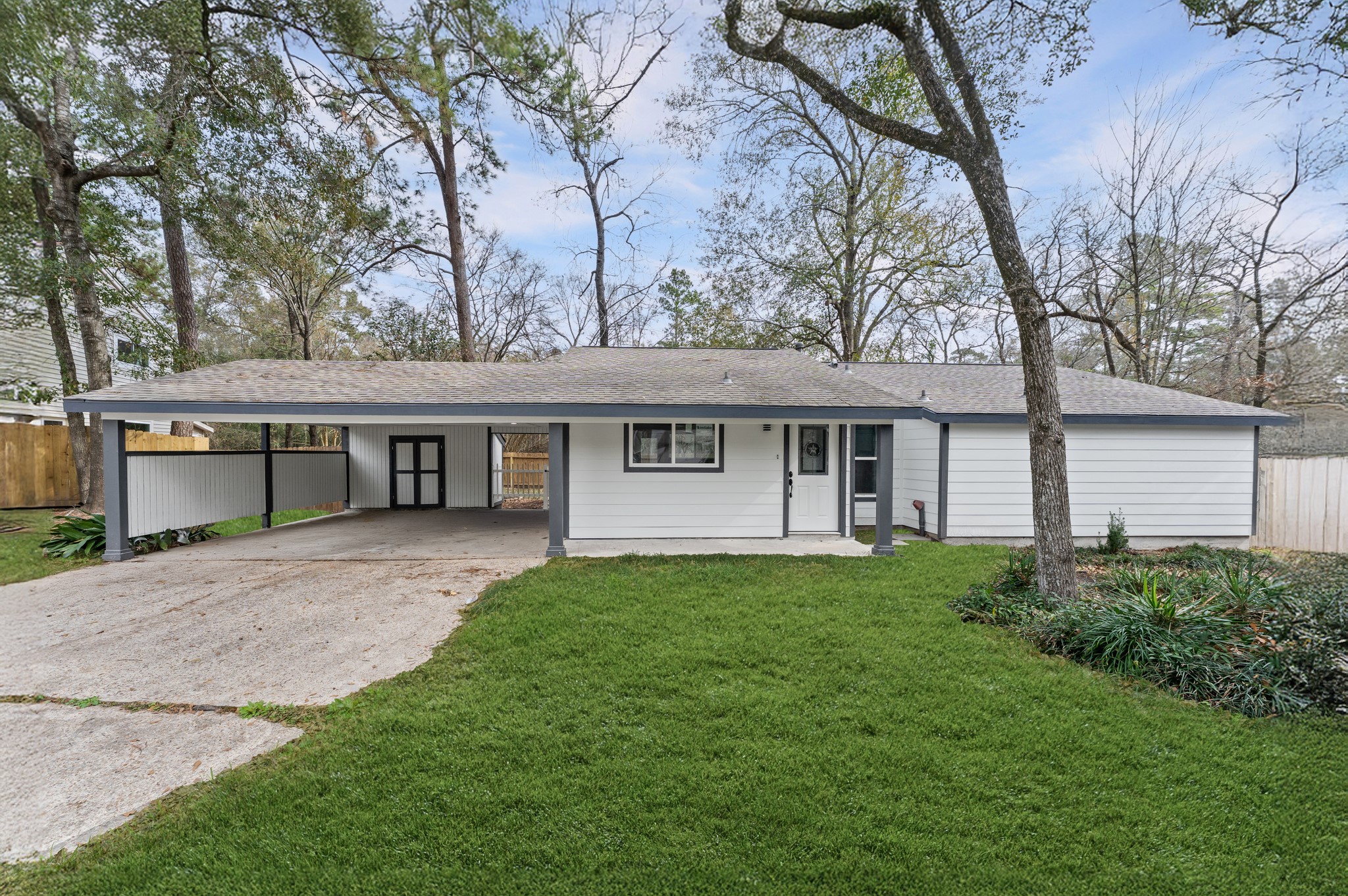 front view of a house with a yard