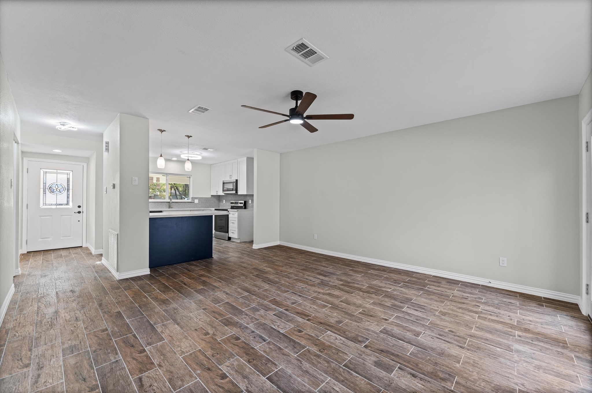 1808 North Red Cedar Circle Spring, TX 77380 - Photo 13 of 31 a view of kitchen with sink and wooden floor