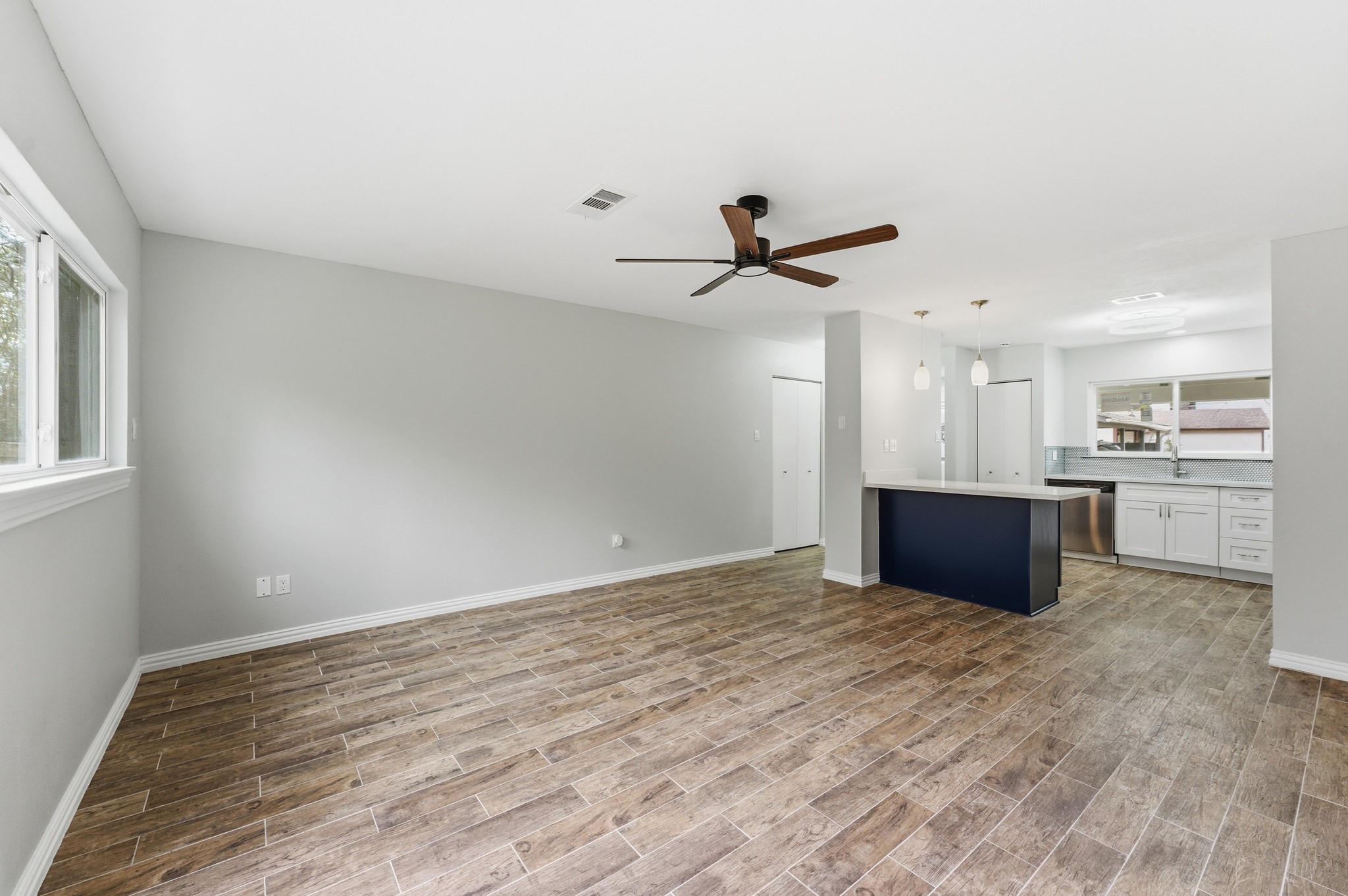 1808 North Red Cedar Circle Spring, TX 77380 - Photo 19 of 31 a view of kitchen with wooden floor and window