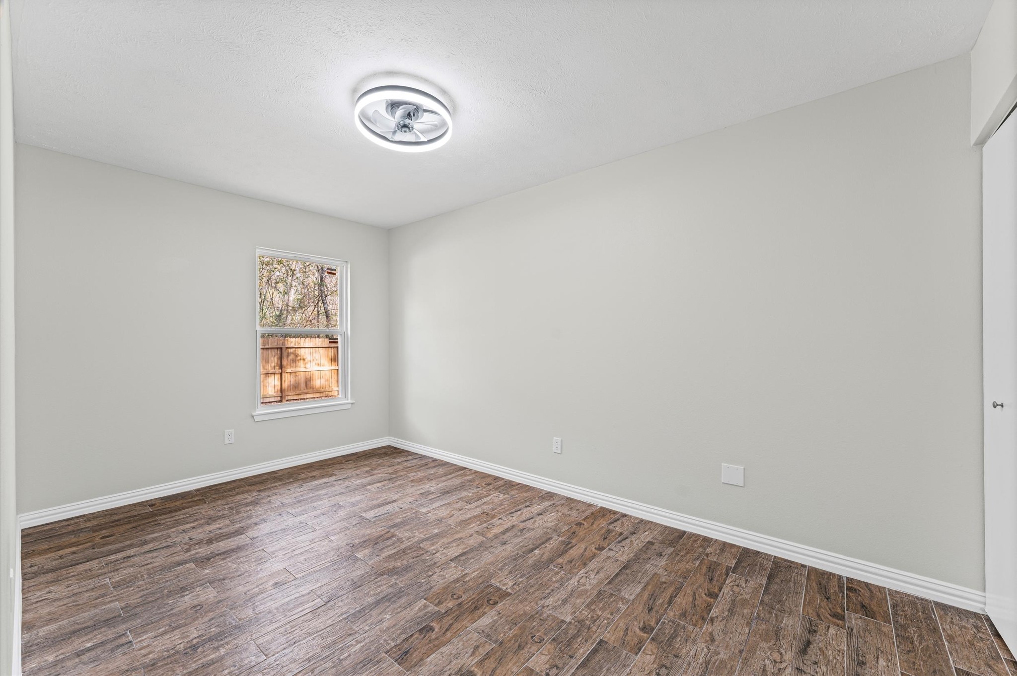 1808 North Red Cedar Circle Spring, TX 77380 - Photo 25 of 31 an empty room with a window