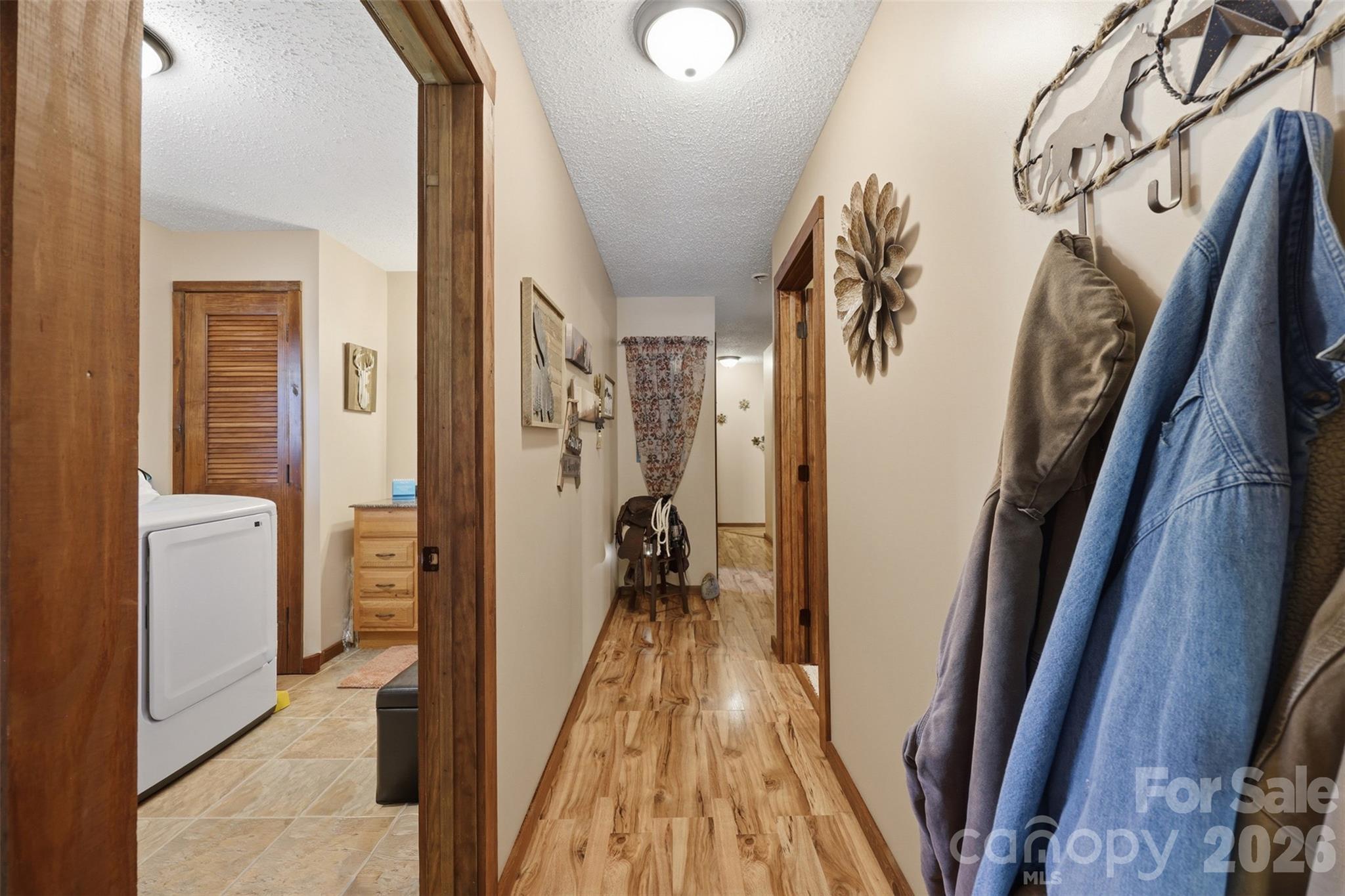 176-174 Oak Hollow Road Union Grove, NC 28689 - Photo 41 of 48 a view of hallway with wooden floor and stairs