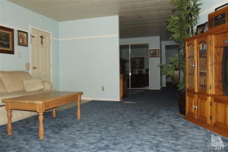 6480 Katherine Road, Unit 35 Simi Valley, CA 93063 - Photo 8 of 16 a living room with furniture