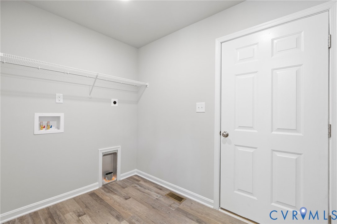 69 Pinewood Lane Colonial Beach, VA 22443 - Photo 12 of 20 Washroom featuring wood finished floors, hookup fo