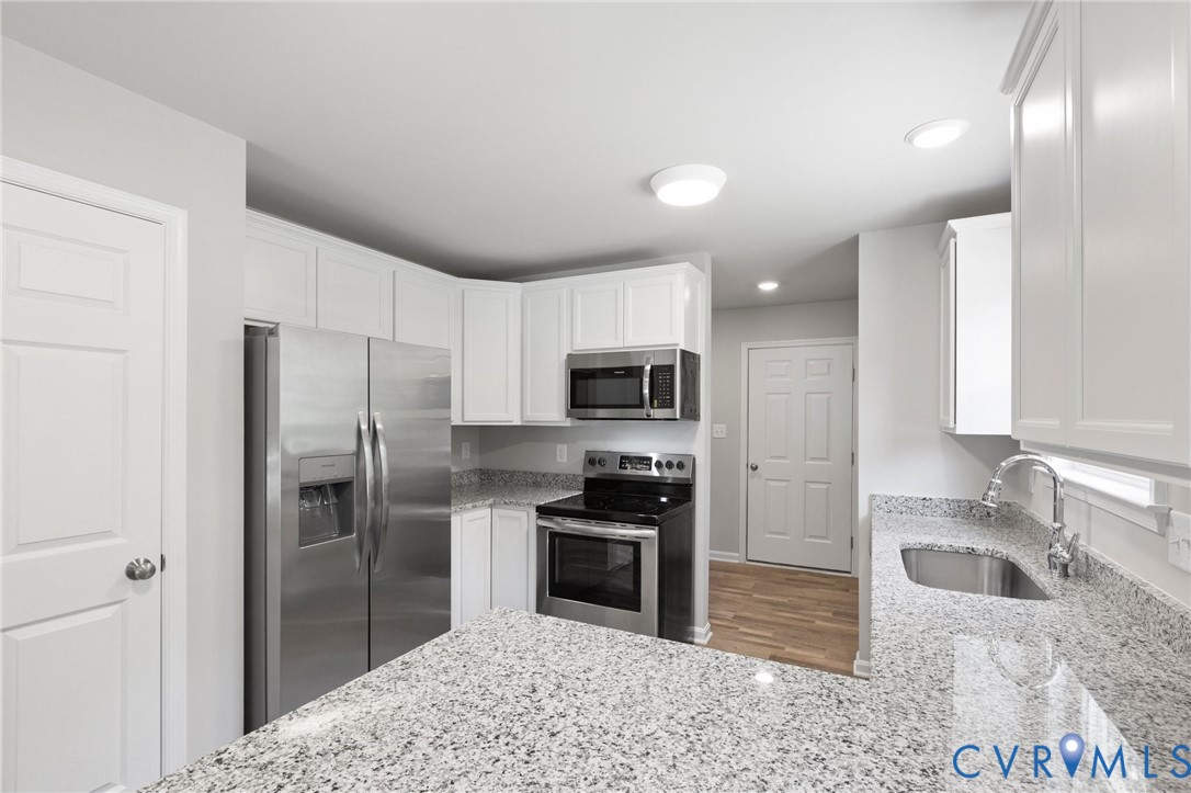 69 Pinewood Lane Colonial Beach, VA 22443 - Photo 6 of 20 Kitchen featuring appliances with stainless steel