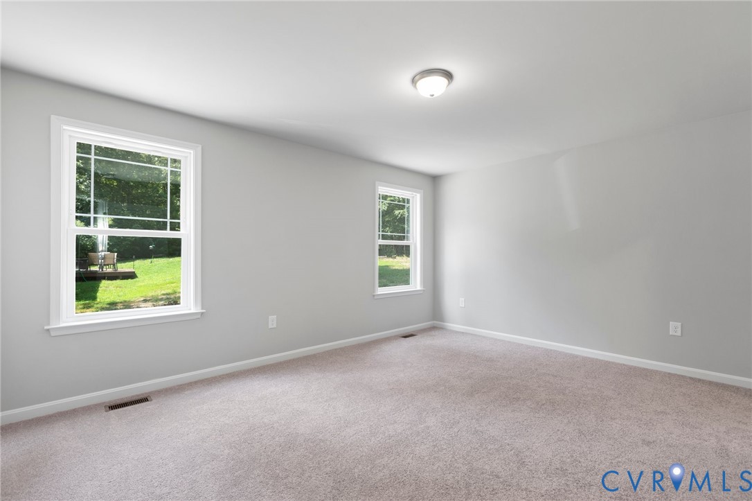 69 Pinewood Lane Colonial Beach, VA 22443 - Photo 10 of 20 Empty room featuring carpet and baseboards