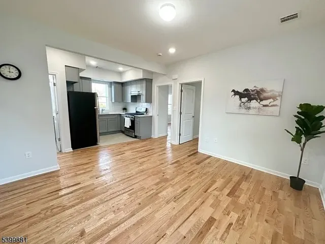 a bedroom with a bed and a walk in closet