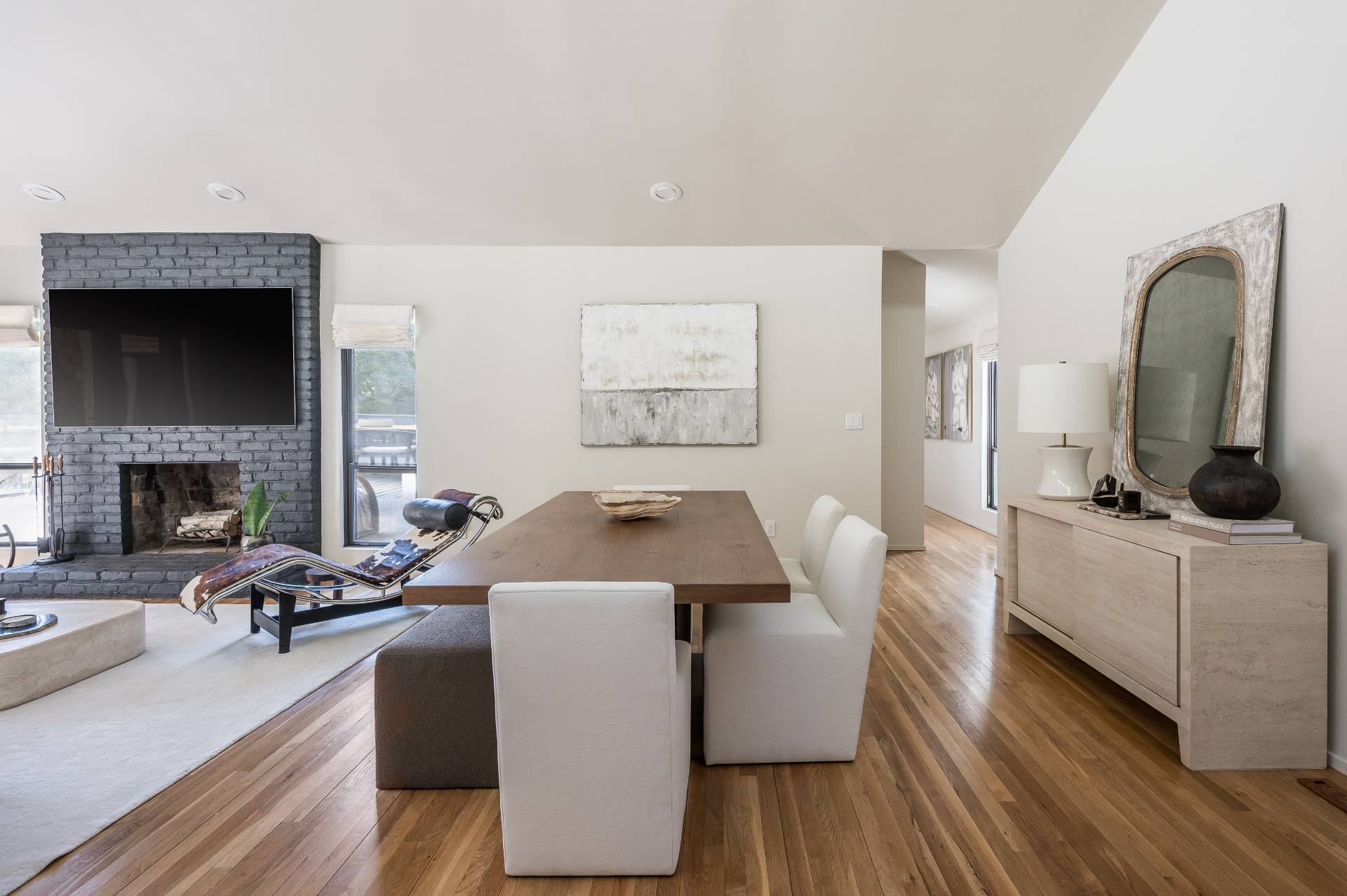 12 Rivers Road East Hampton, NY 11937 - Photo 11 of 23 a living room with furniture a fireplace and wooden floor