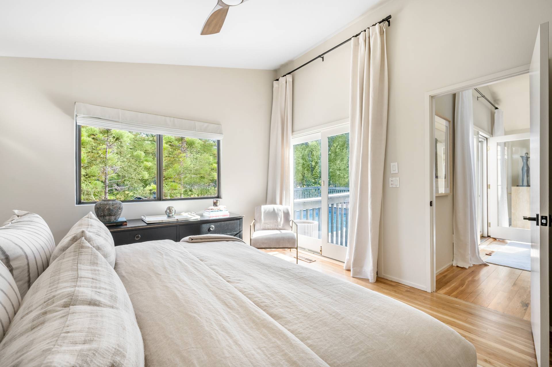 12 Rivers Road East Hampton, NY 11937 - Photo 15 of 23 a bedroom with a bed and large windows