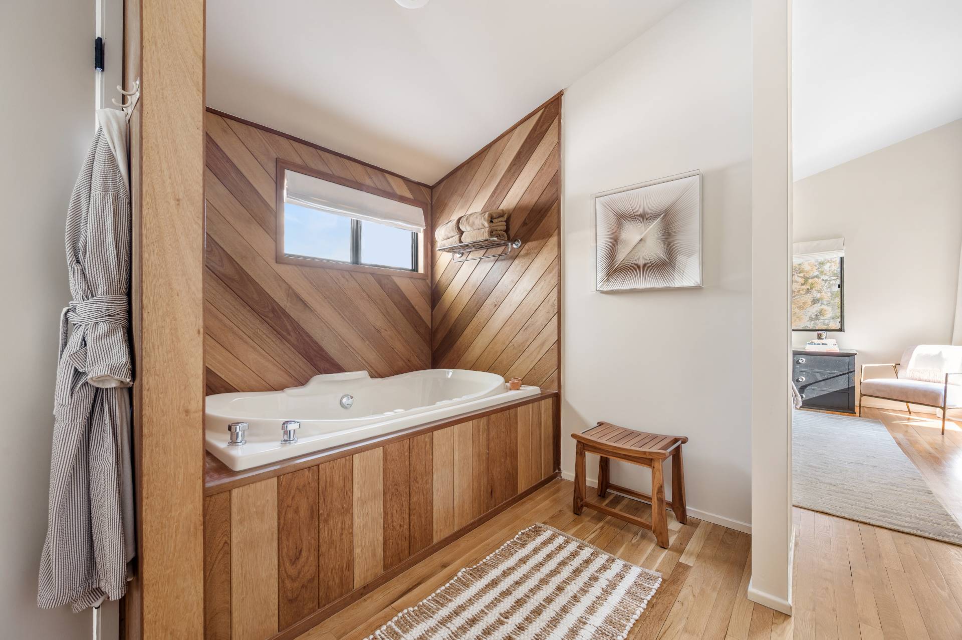 12 Rivers Road East Hampton, NY 11937 - Photo 16 of 23 a living room with a couch and a table