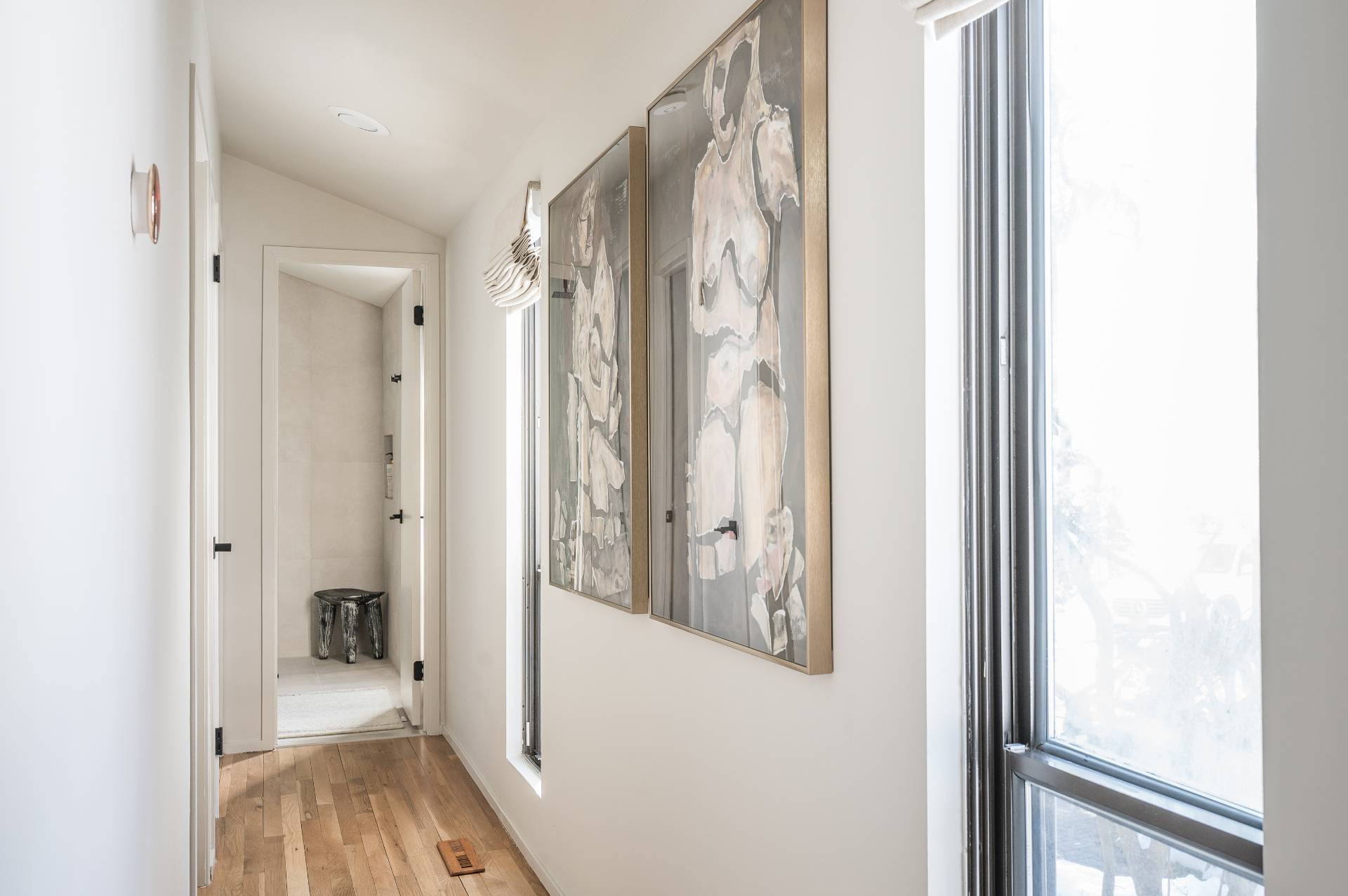 12 Rivers Road East Hampton, NY 11937 - Photo 18 of 23 a view of a hallway with wooden floor and a bathroom