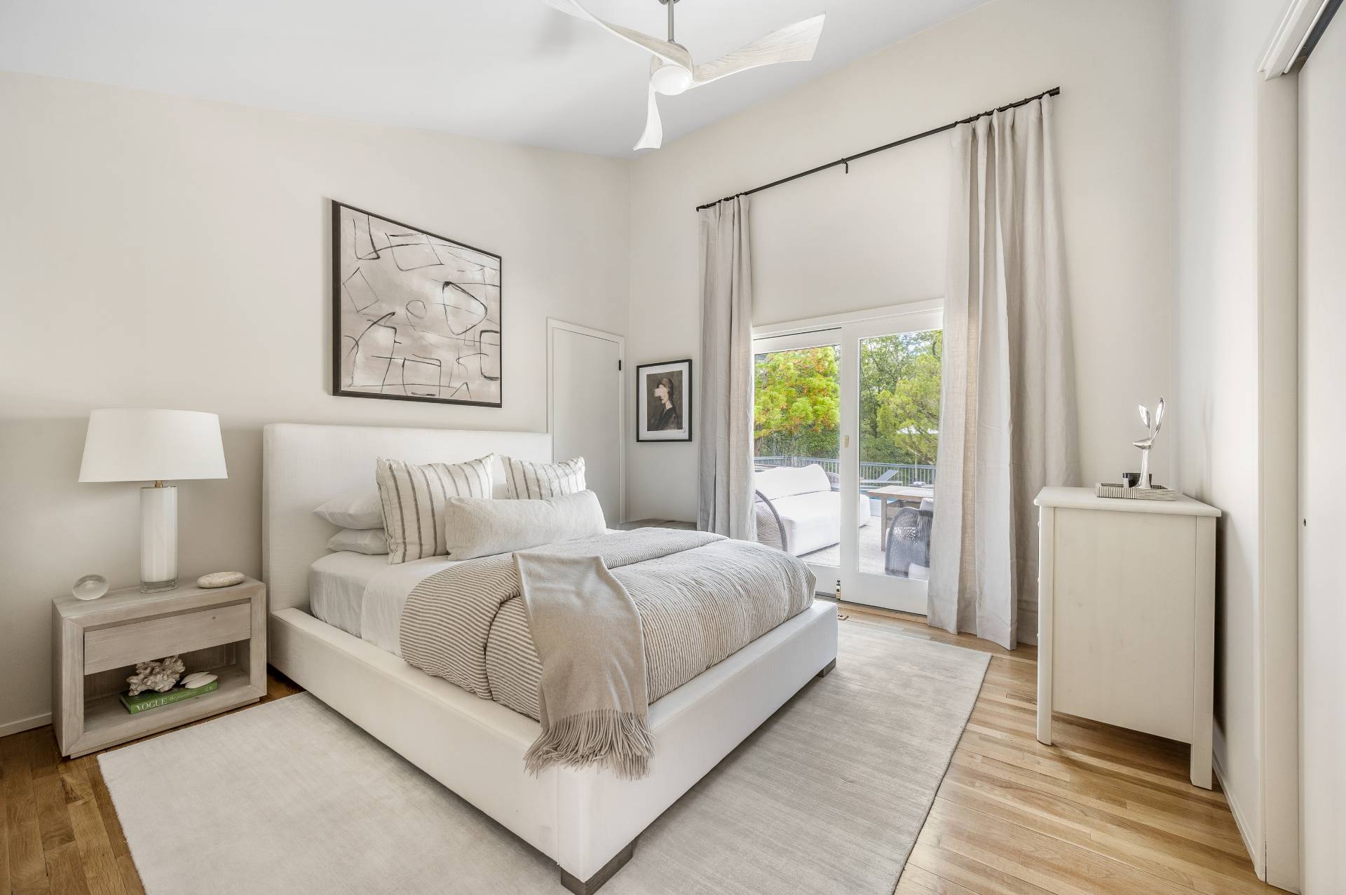 12 Rivers Road East Hampton, NY 11937 - Photo 19 of 23 a bedroom with a bed and a window