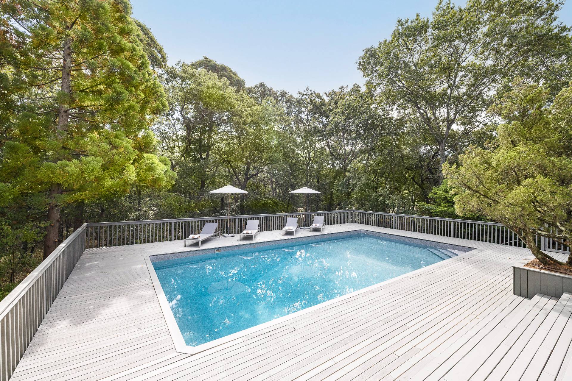 12 Rivers Road East Hampton, NY 11937 - Photo 23 of 23 a view of a swimming pool with a patio