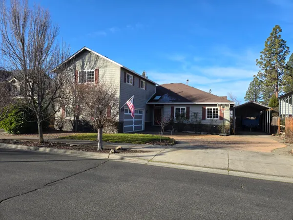 a view of a house with a street