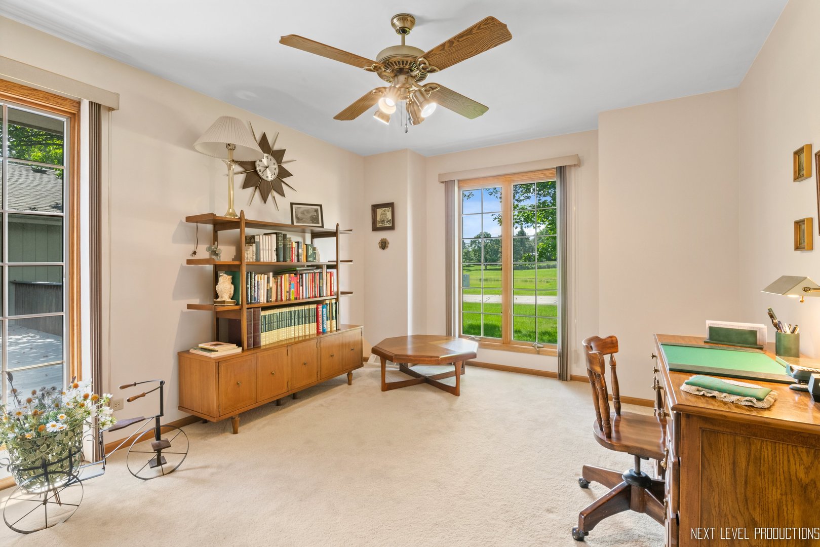 11N699 Old Barn Road Elgin, IL 60124 - Photo 19 of 32 a living room with furniture gym equipment and a window