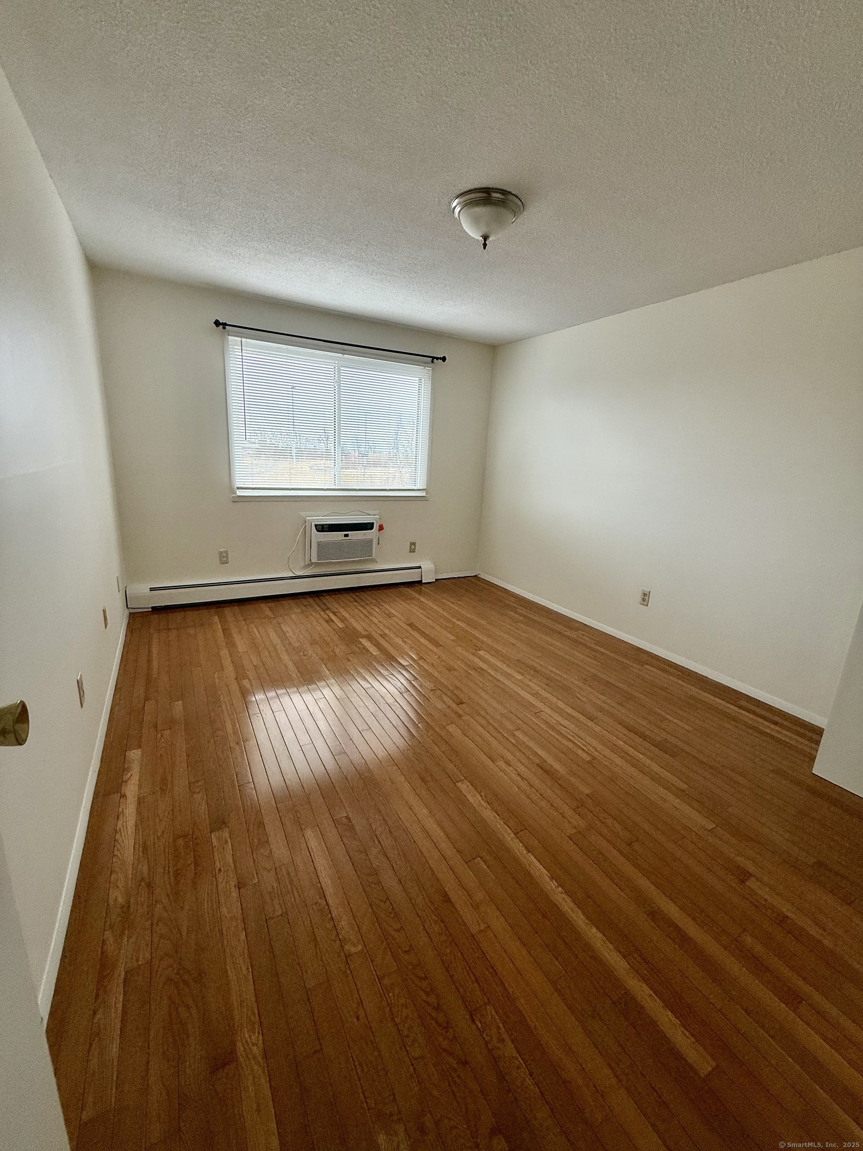 1168 Main Street, Unit C7 Stratford, CT 06615 - Photo 3 of 12 wooden floor in a room