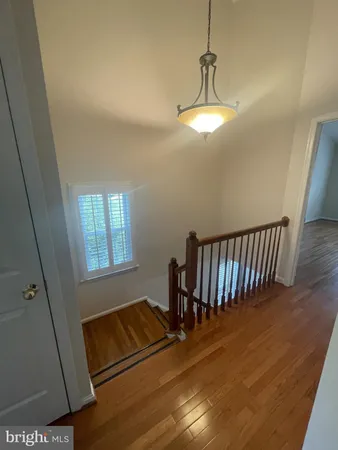 a view of a livingroom with a staircase
