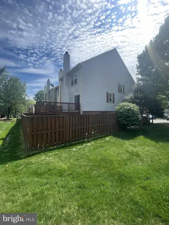 a backyard of a house wit trees