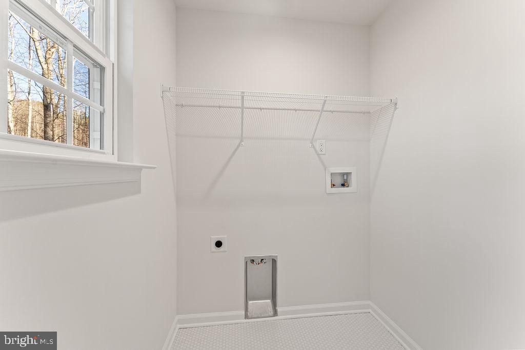 2770 Fredericks Hall Road Mineral, VA 23117 - Photo 19 of 57 a view of a closet area with hallway