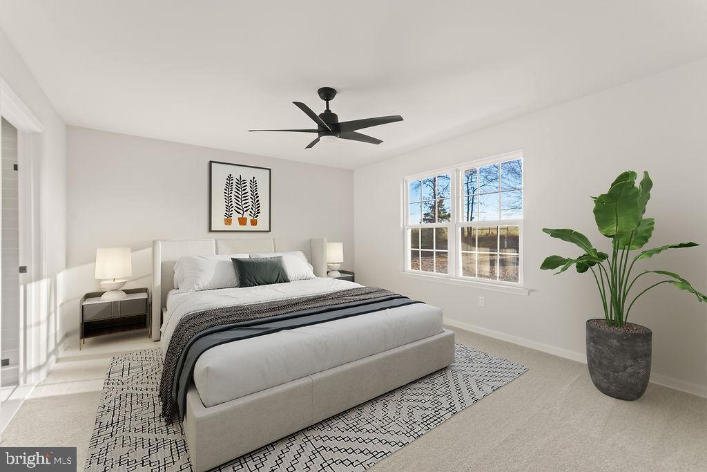 2770 Fredericks Hall Road Mineral, VA 23117 - Photo 20 of 57 Bright and airy bedroom with modern charm.