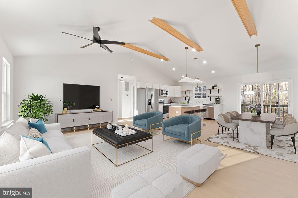 2770 Fredericks Hall Road Mineral, VA 23117 - Photo 2 of 57 a living room with furniture and a flat screen tv