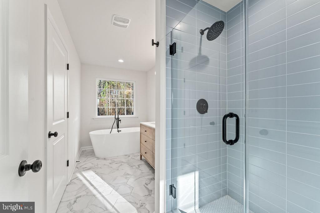 2770 Fredericks Hall Road Mineral, VA 23117 - Photo 24 of 57 Serene bathroom oasis with modern elegance.