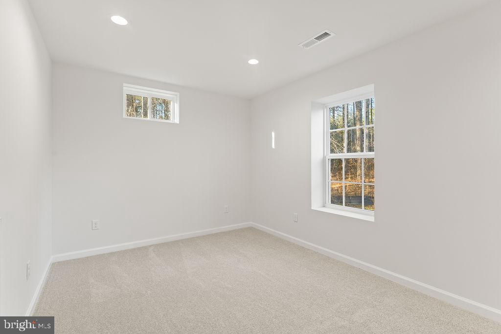 2770 Fredericks Hall Road Mineral, VA 23117 - Photo 38 of 57 an empty room with a window