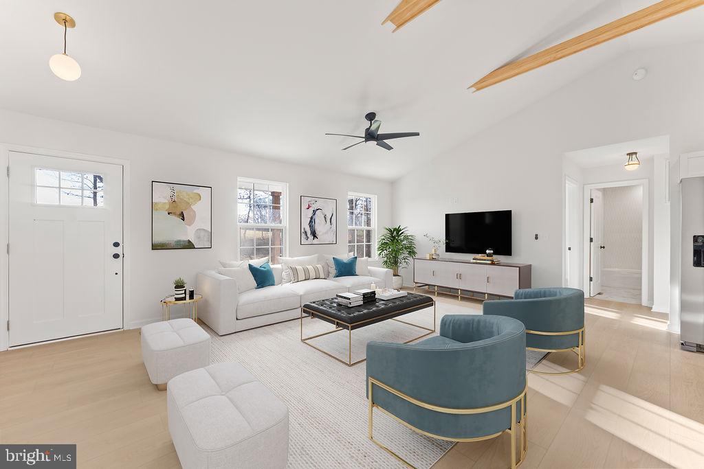 2770 Fredericks Hall Road Mineral, VA 23117 - Photo 4 of 57 a living room with furniture a flat screen tv and a window