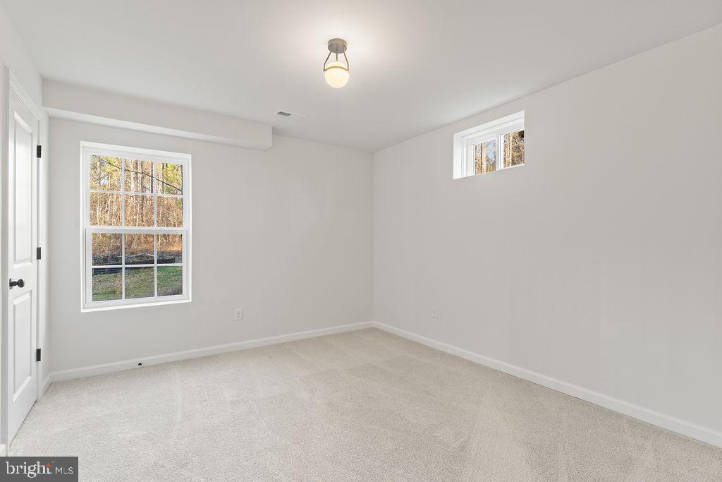 2770 Fredericks Hall Road Mineral, VA 23117 - Photo 42 of 57 an empty room with a window