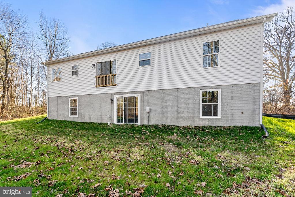 2770 Fredericks Hall Road Mineral, VA 23117 - Photo 53 of 57 a view of a house with a yard