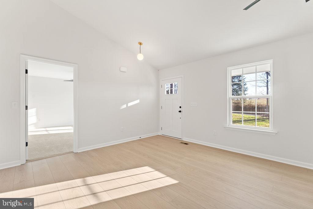 2770 Fredericks Hall Road Mineral, VA 23117 - Photo 8 of 57 an empty room with windows and closet