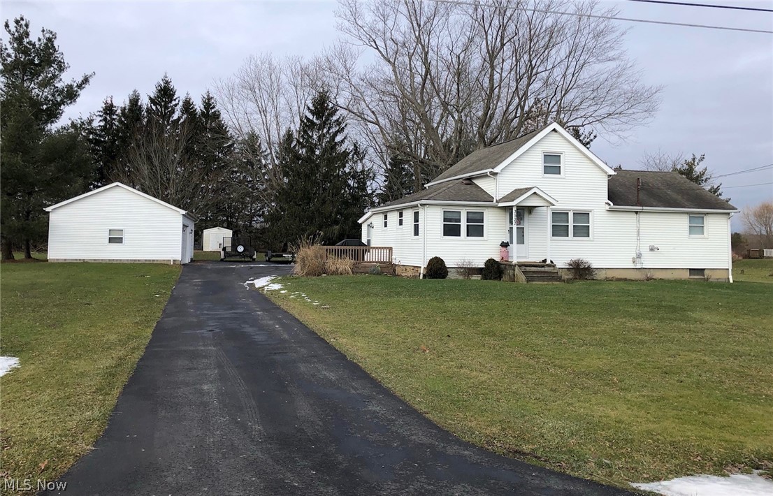 3527 Maple Road Jefferson, OH 44047 - Photo 2 of 22 Paved driveway added in 2017. Resealed lasst year. Notice the deck off of the back door